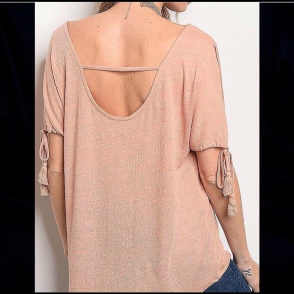 Super cute blush top with dropped back detail! - Picture 2 of 2
